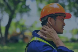 man with neck injury at job site